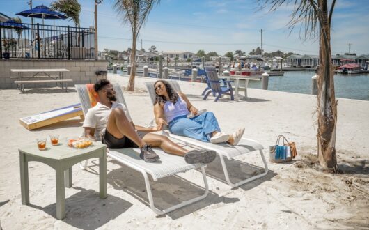 Couple in lounge chairs at Blufin